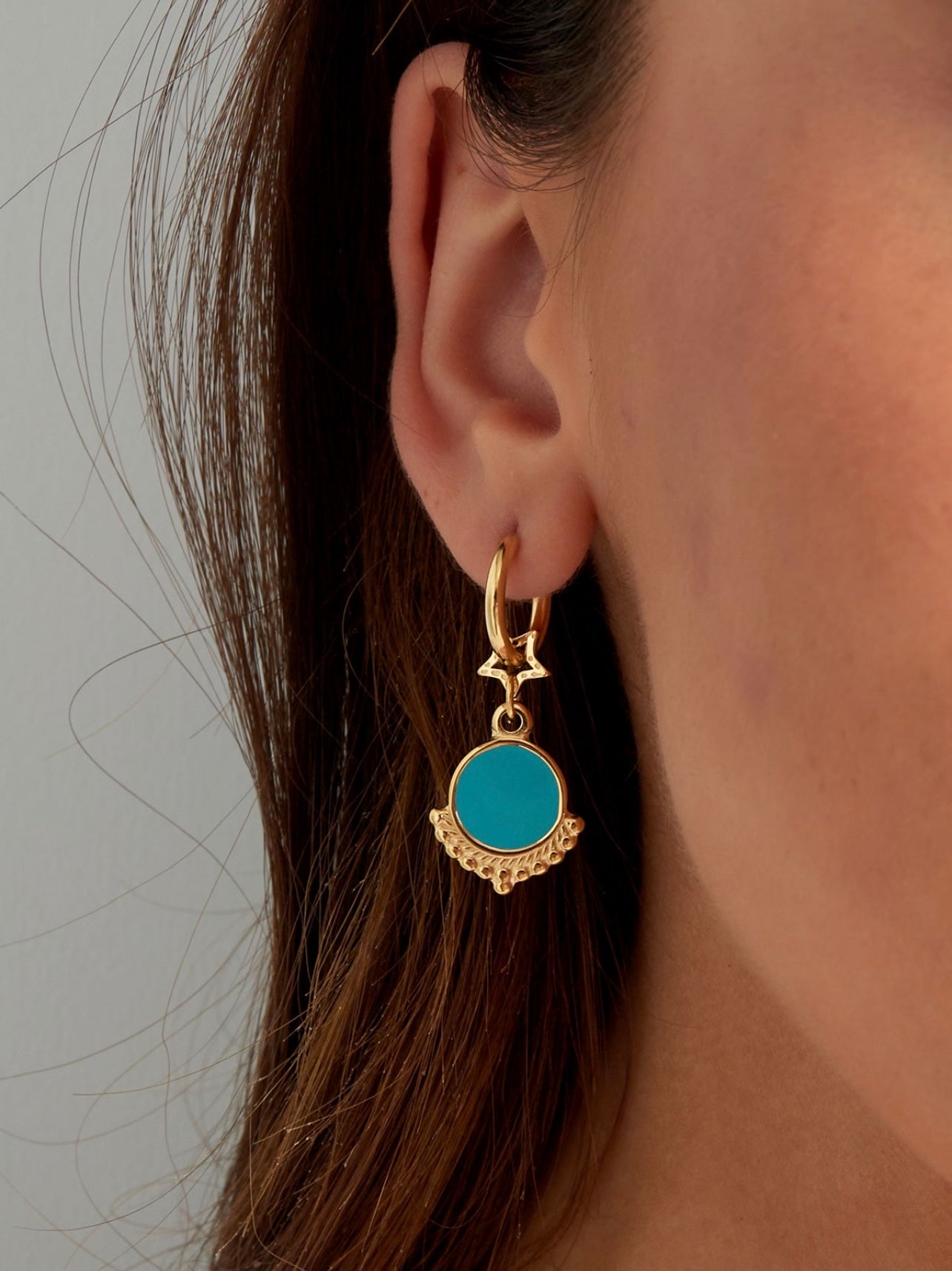 Orecchini con stella e ciondolo